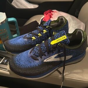 Shoes,brand is brooks, size 12.5, color is blue, black,greenish/yellow.